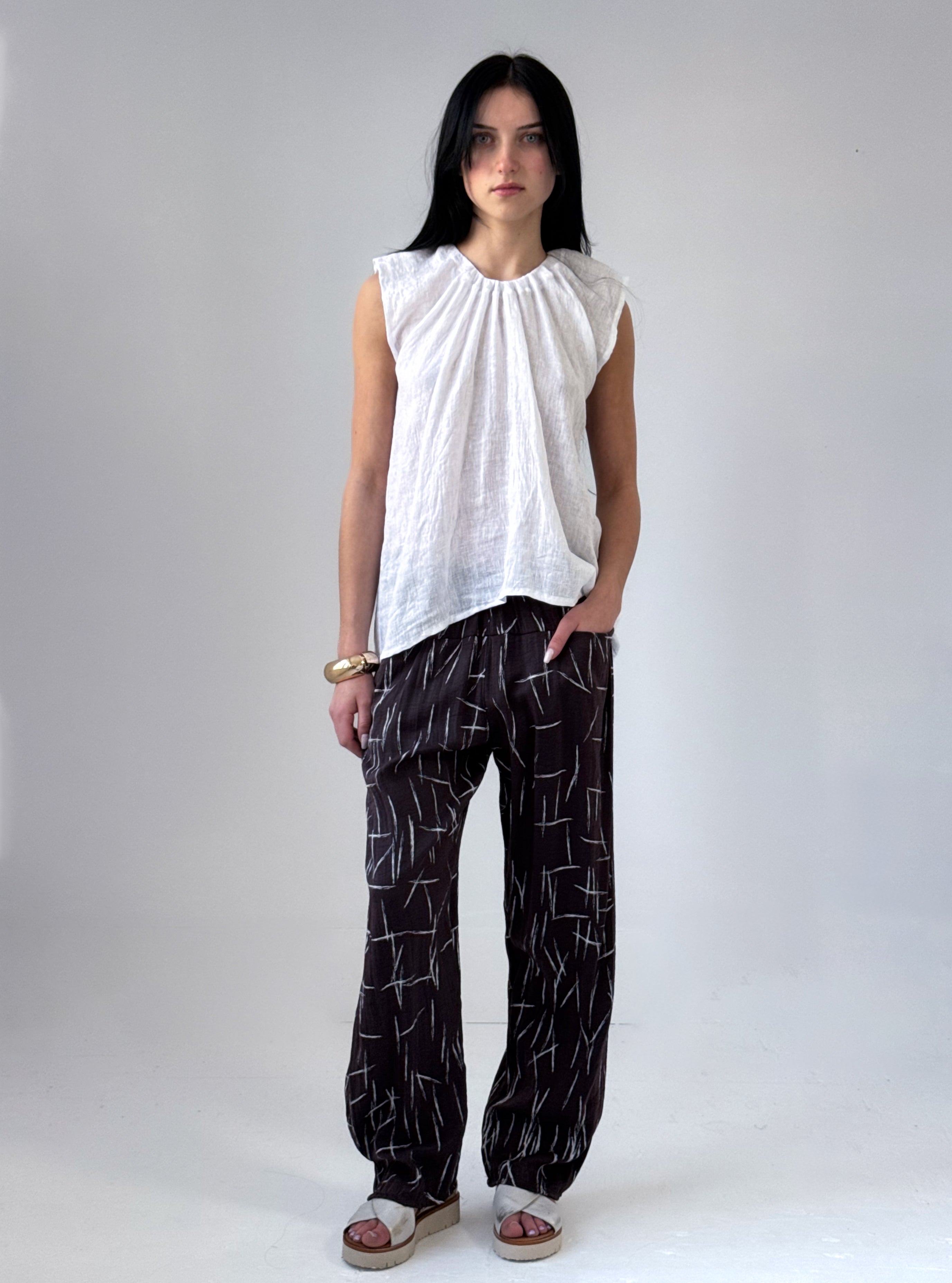 Remy loose fit pants in espresso viscose satin with abstract quill print and elastic waistband