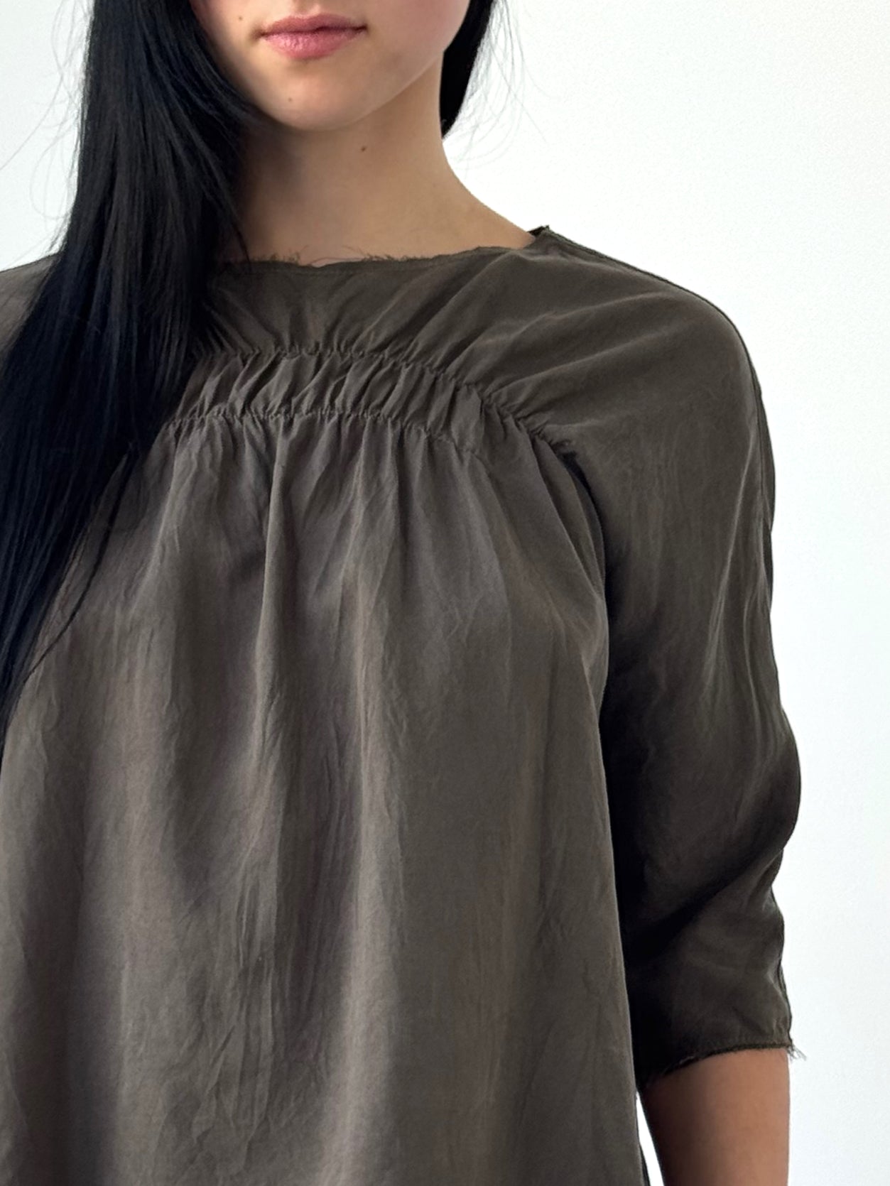 Orin washed tencel twill top with elastic ruching and raw edge neckline, fluid minimalist blouse in soft charcoal tone, modern understated style