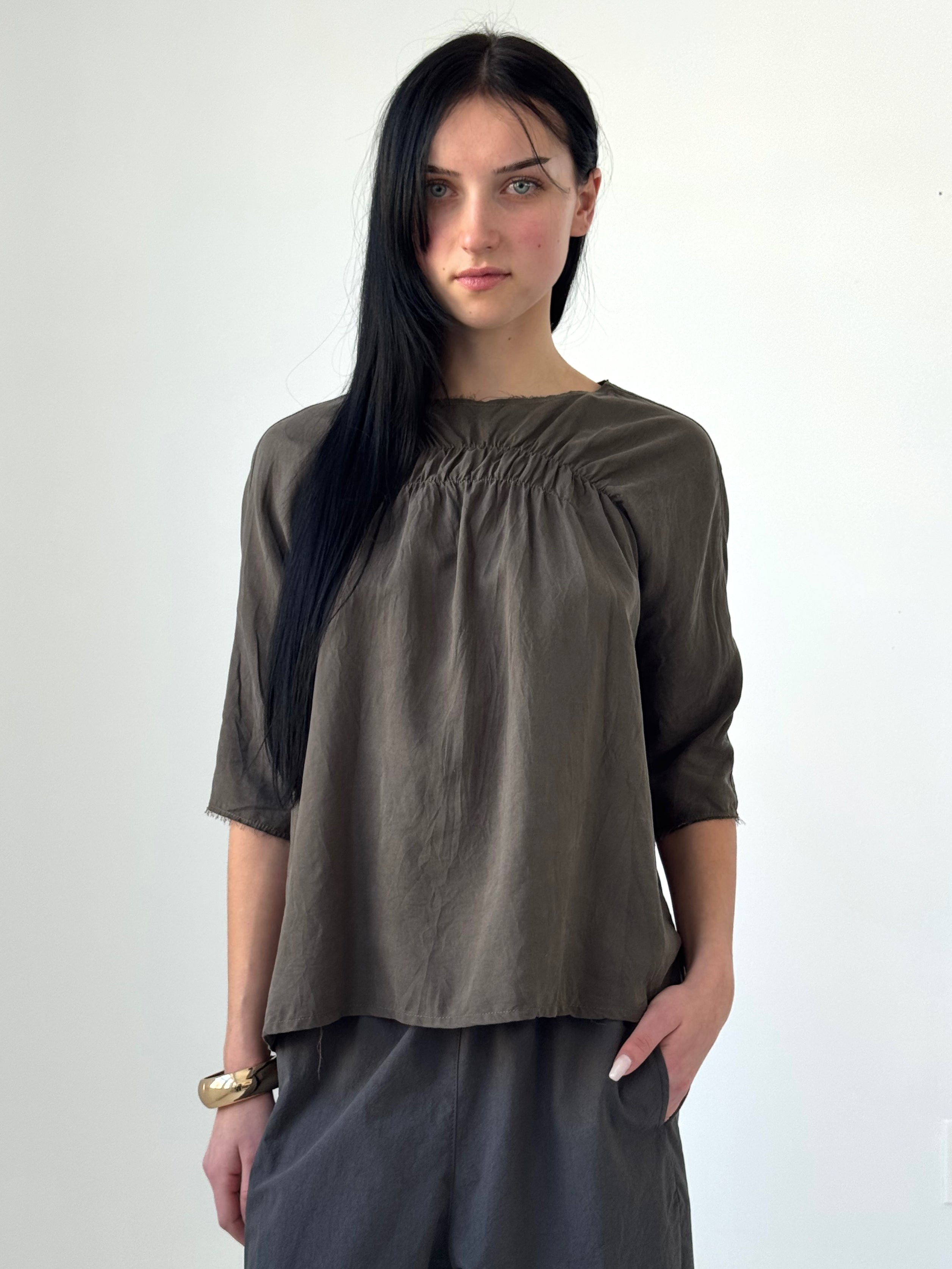 Orin washed tencel twill top with elastic ruching and raw edge neckline, fluid minimalist blouse in soft charcoal tone, modern understated style