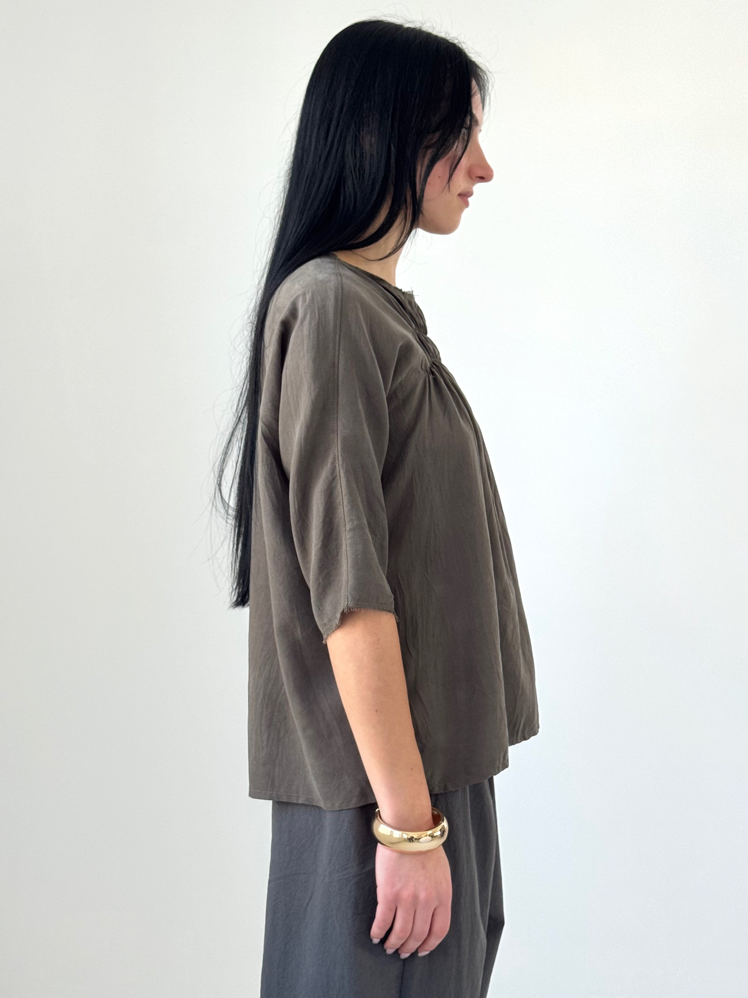 Orin washed tencel twill top with elastic ruching and raw edge neckline, fluid minimalist blouse in soft charcoal tone, modern understated style