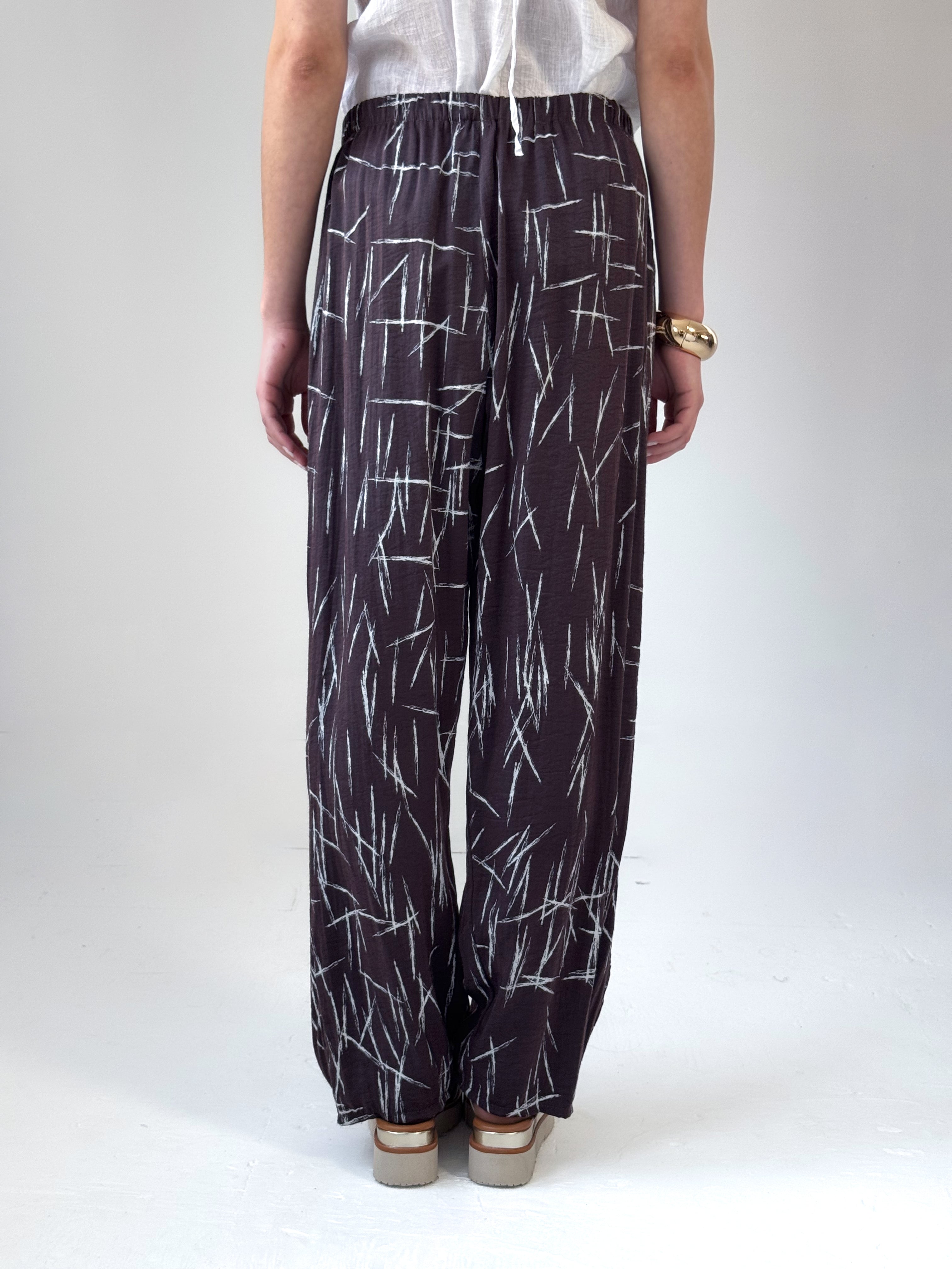 Remy loose fit pants in espresso viscose satin with abstract quill print and elastic waistband