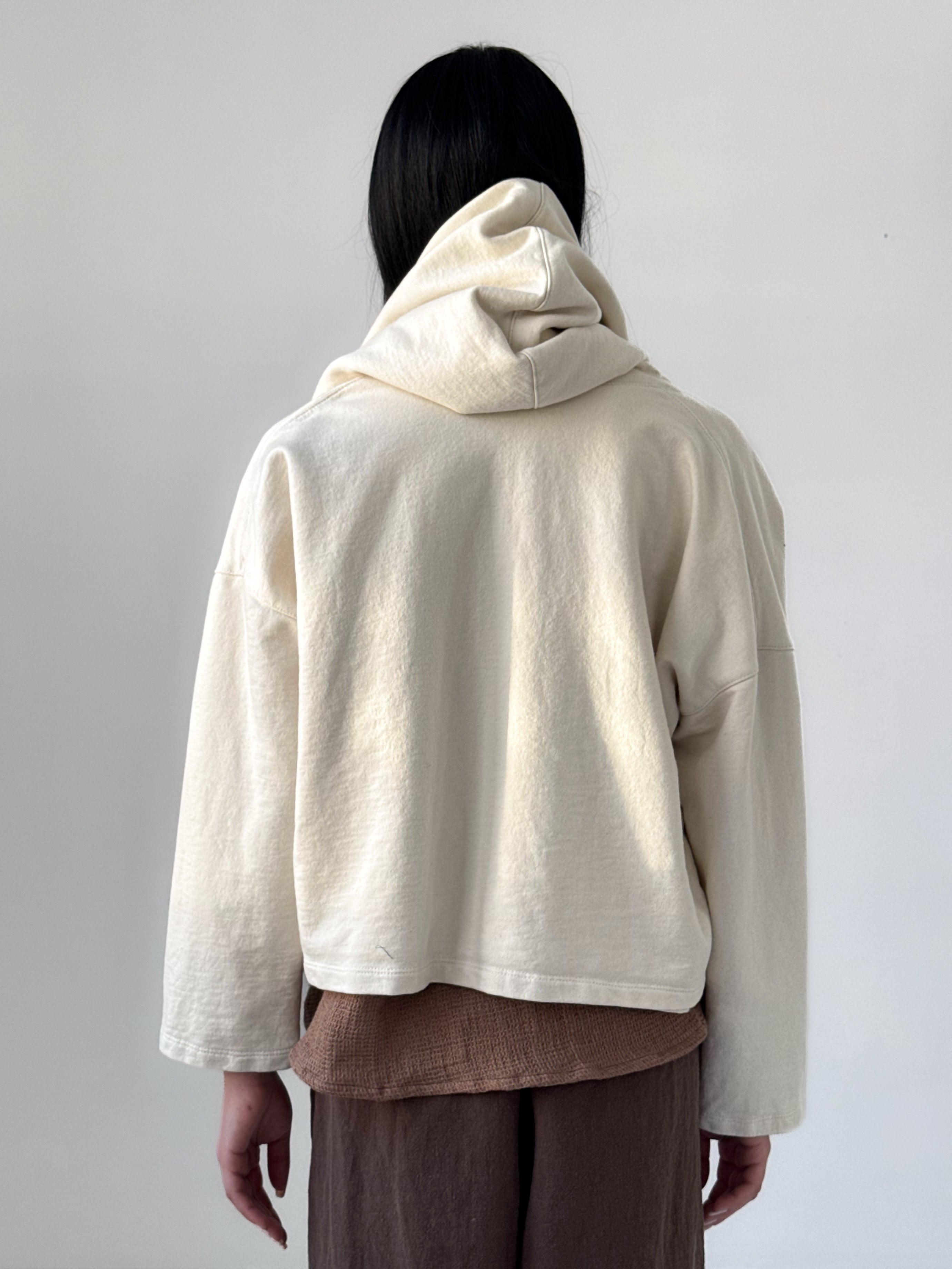 Rihana organic cotton fleece hoodie in bone with oversized hood and relaxed drape