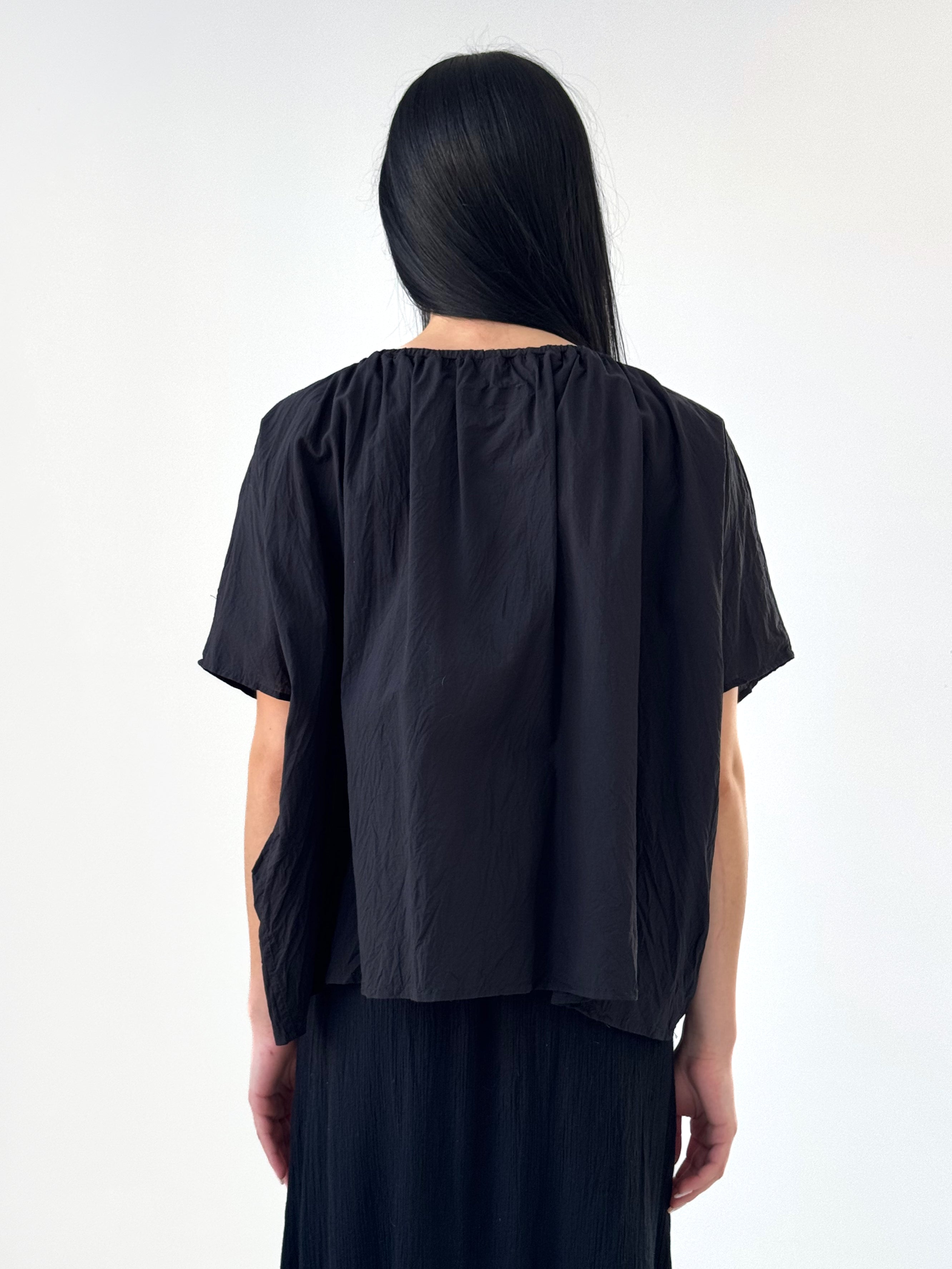 Savanah voluminous black cotton voile top with gathered elastic neckline and airy silhouette