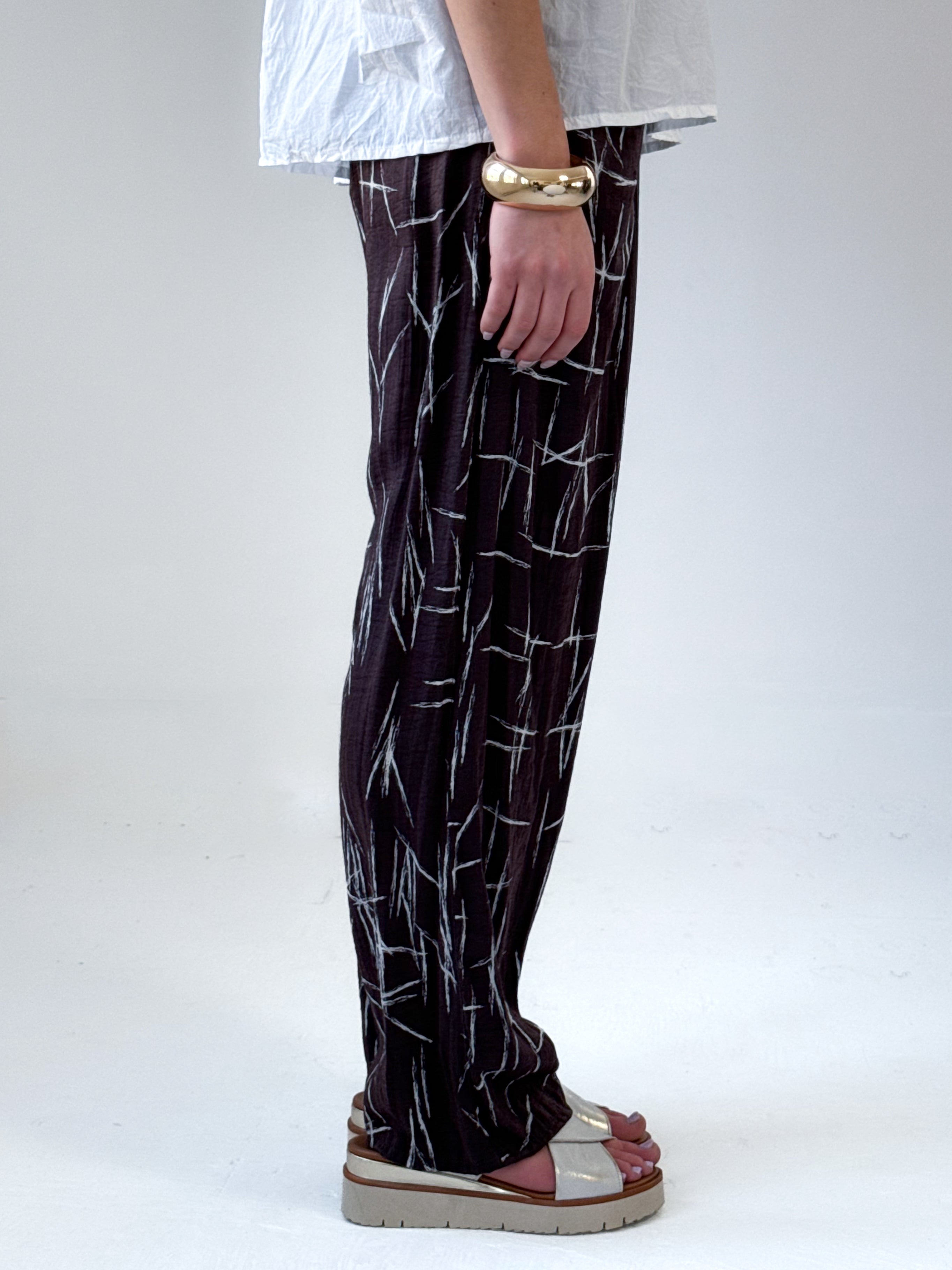 Remy loose fit pants in espresso viscose satin with abstract quill print and elastic waistband