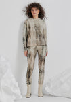 FRED (legging seen in cement print)